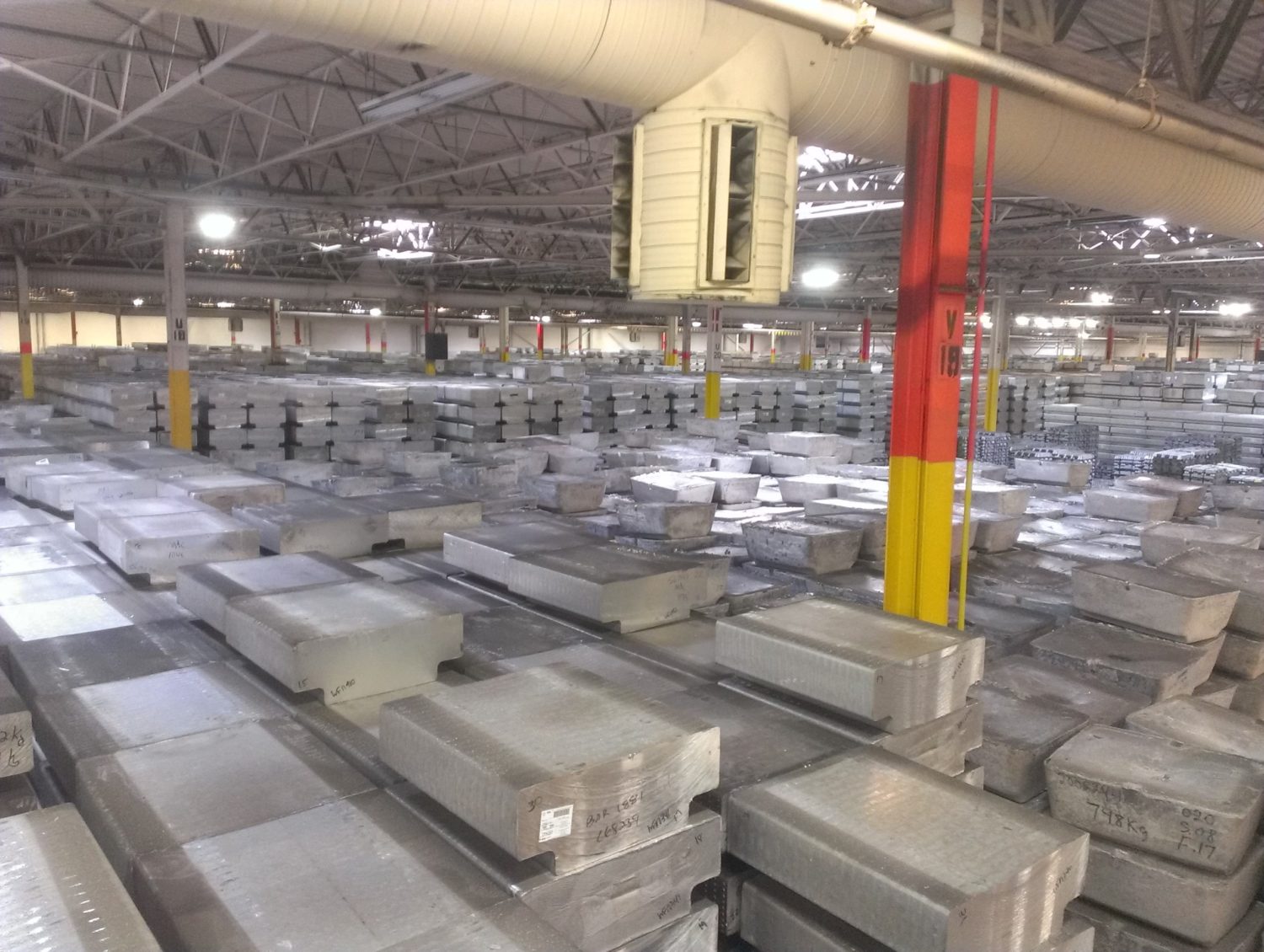 a warehouse full of aluminum ingots.